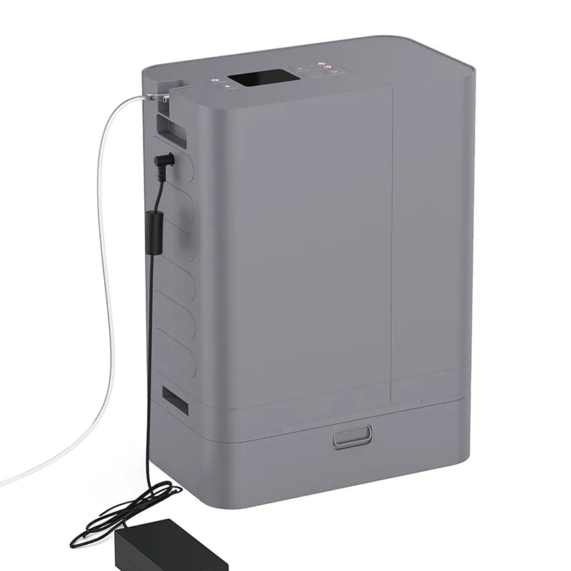 Kingon P2 TOC Transportable Portable Oxygen Concentrator plugged in and with nasal cannula. Shop now at Zone Medical.