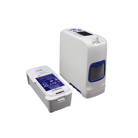 Inogen Rove 6 Portable Oxygen Concentrator next to the battery. Shop now at Zone Medical.