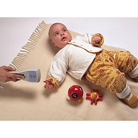 Interacoustics PA5 Pediatric Audiometer in use with a baby next to it. Shop now at Zone Medical.