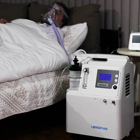 Longfian Jay 5 Stationary Oxygen Concentrator old man sleeping with an oxygen mask. Shop now at Zone Medical.