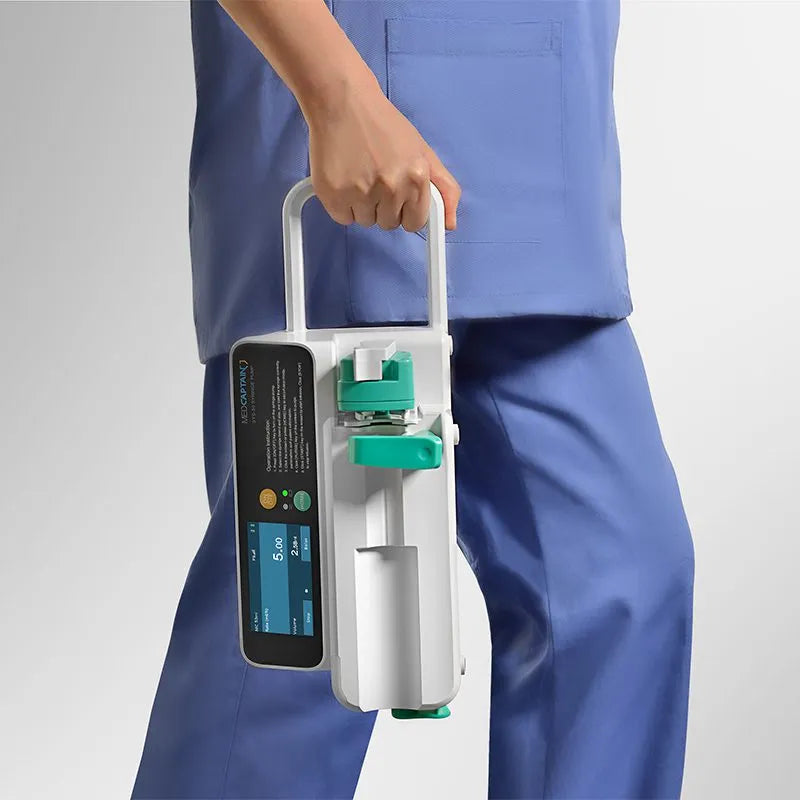 MedCaptain SYS50 Syringe Driver carried by a practitioner. Shop now at Zone Medical.