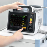 Mindray Beneheart D30 Defibrillator and Monitor with finger. Shop now at Zone Medical.